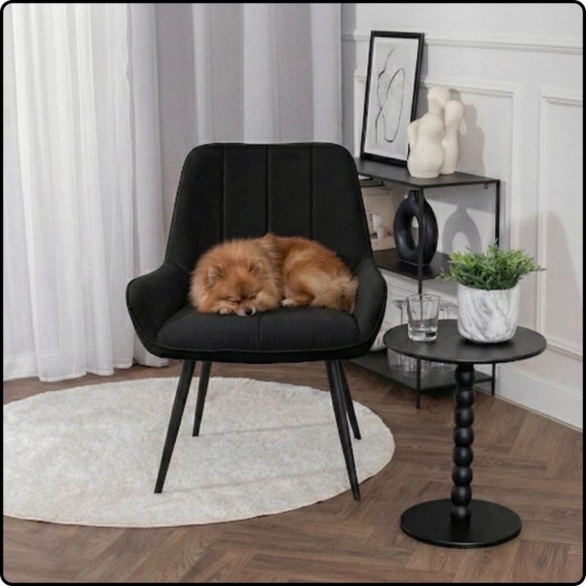Fotel uszak tapicerowany welurowy wygodny z czarnymi nogami do salonu czarny