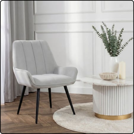 Fotel uszak tapicerowany welurowy wygodny z czarnymi nogami do salonu szary