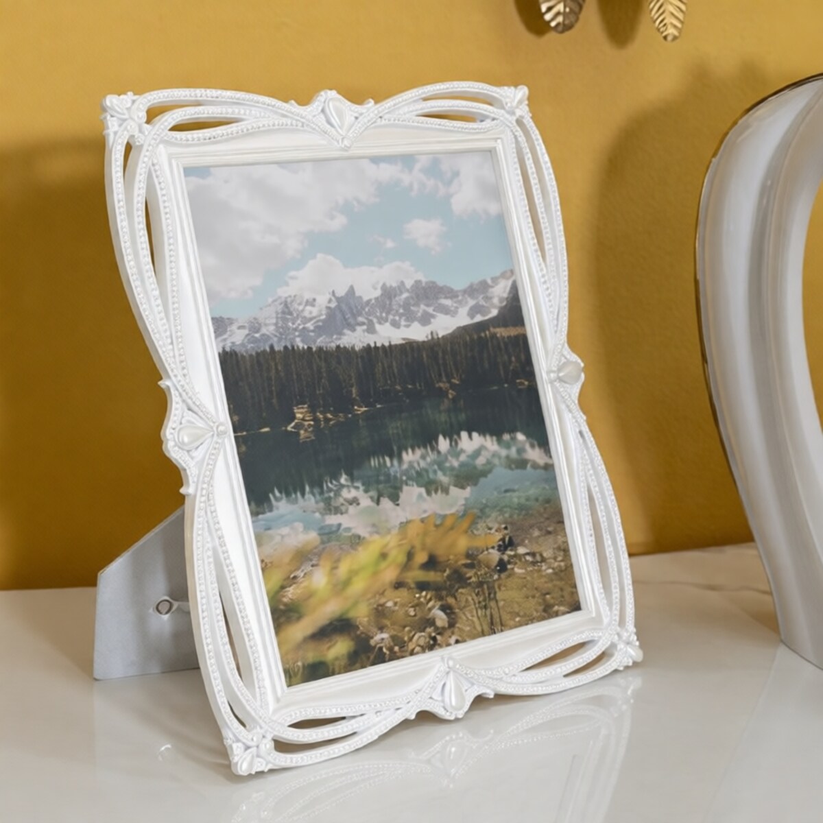 Ramka na zdjęcia Tape, zdjęcie 20 x 25 cm, kolor srebrny, żywica syntetyczna i szkło, rama 27 x 1,7 x 32 cm, na fotografie i portrety, Mauro Ferretti