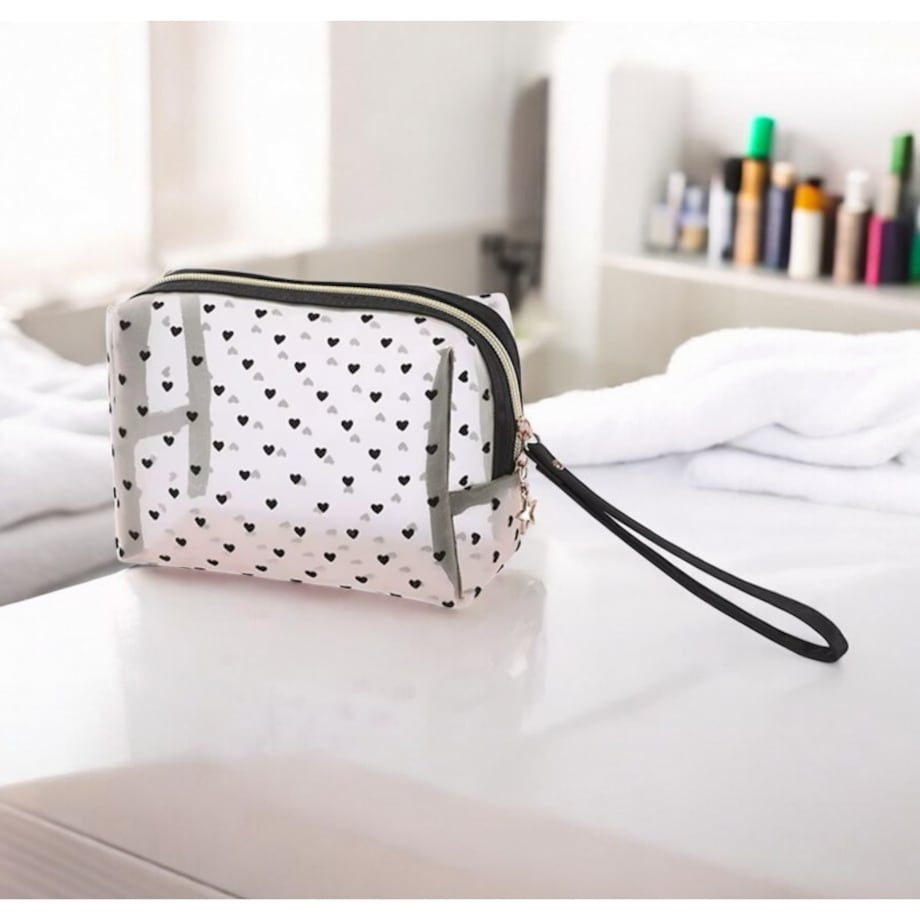 Kosmetyczka damska transparentna czarne serca 12x18x8cm KS126