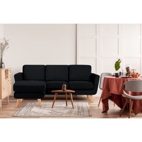 KONSIMO TAGIO Skandynawski narożnik czarny z pufem/ otomaną, lewy