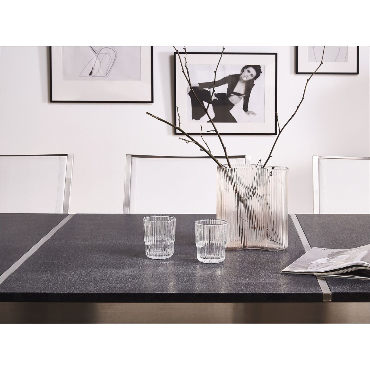 Zestaw ogrodowy stół granit palony dzielony blat czarny i 8 krzeseł białych GROSSETO