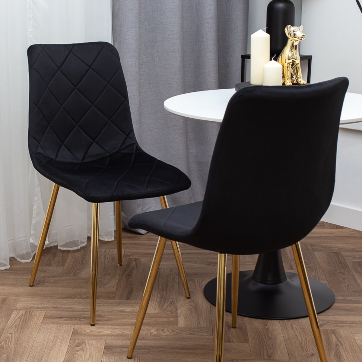 Krzesło tapicerowane czarne welurowe pikowane nowoczesne złote nogi