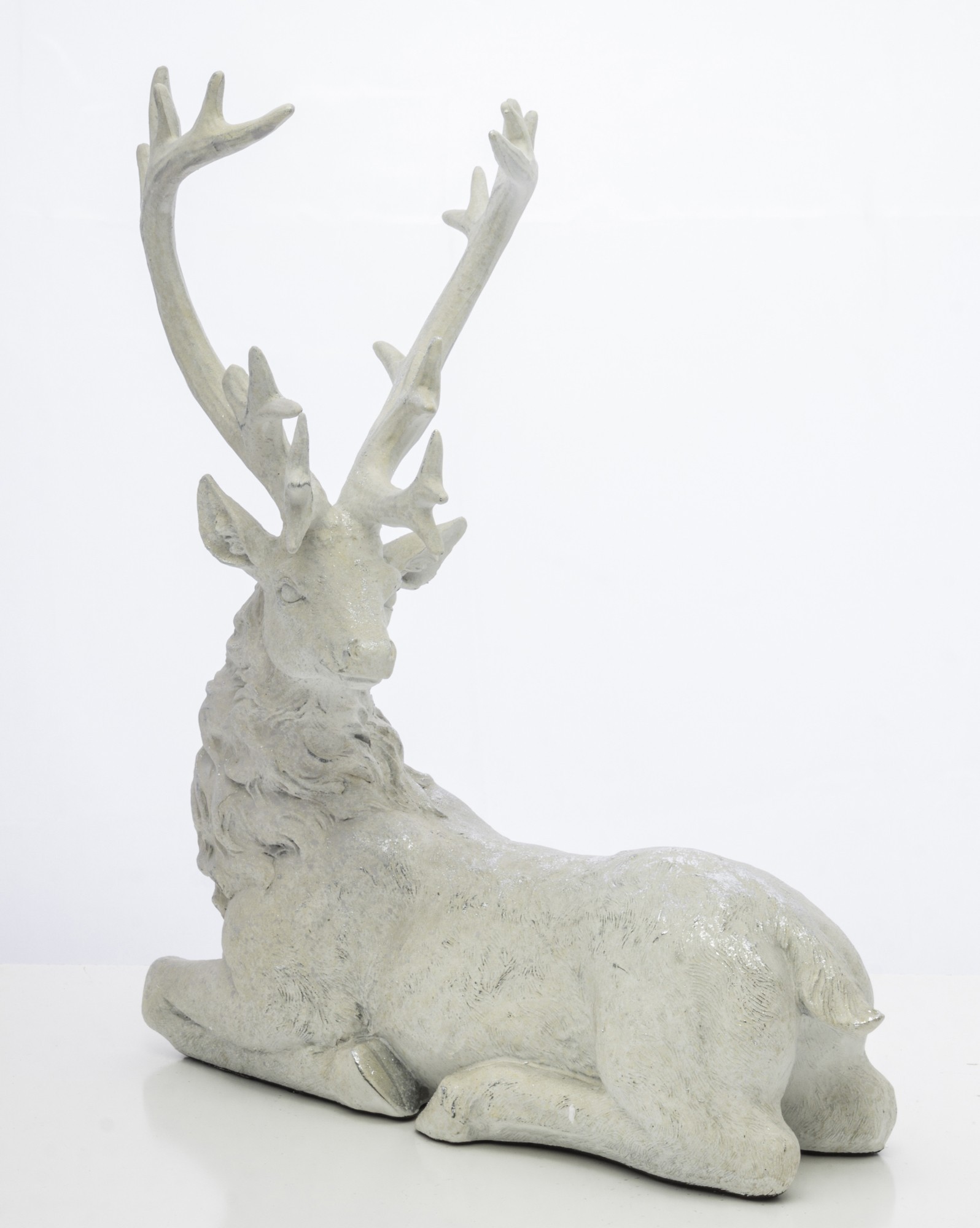 Dekoracja - figurka leżącego białego jelenia 38x32x15 cm KARGU-3 srebrny