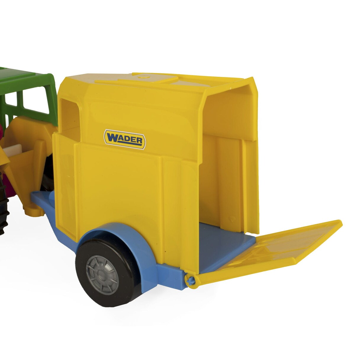 Traktor z przyczepą na konia