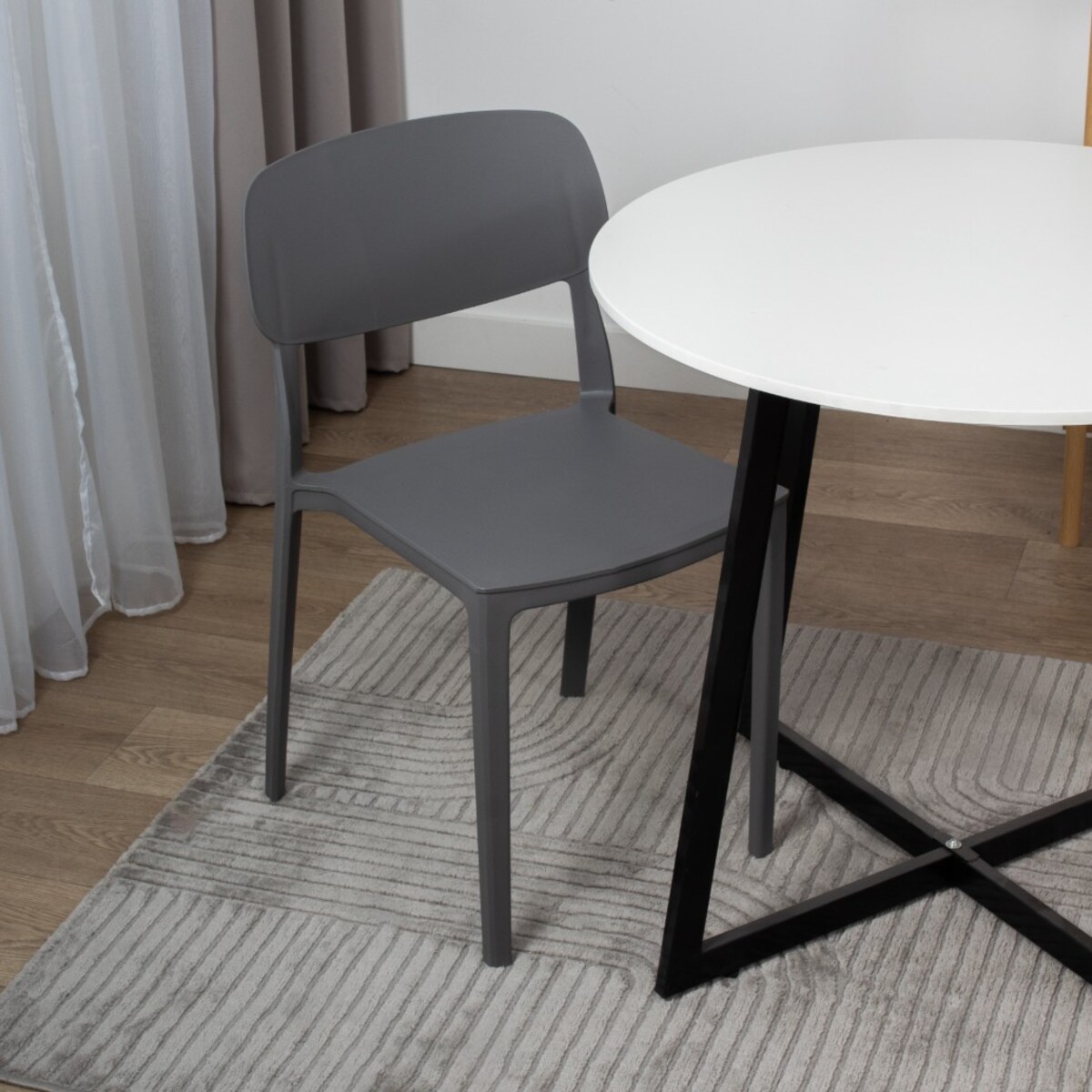 Krzesło plastikowe do salonu ogrodu nowoczesne szare oparcie