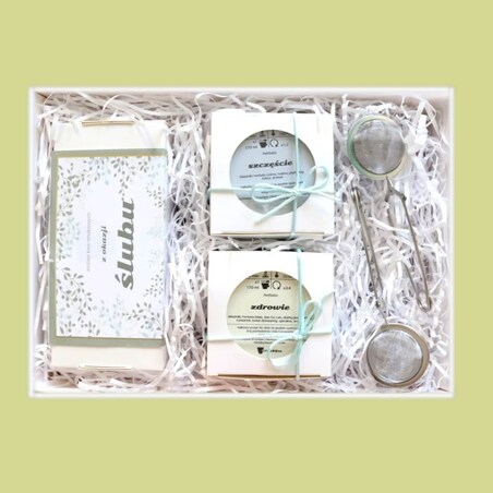 Zestaw prezentowy na ślub ŚLUBNE ŻYCZENIA. Zestaw 20 saszetek - 20x 10g z kawą mieloną o różnych smakach, herbata czarna Szczęście 120g, herbata biała Zdrowie 60g i dwa poręczne zaparzacze