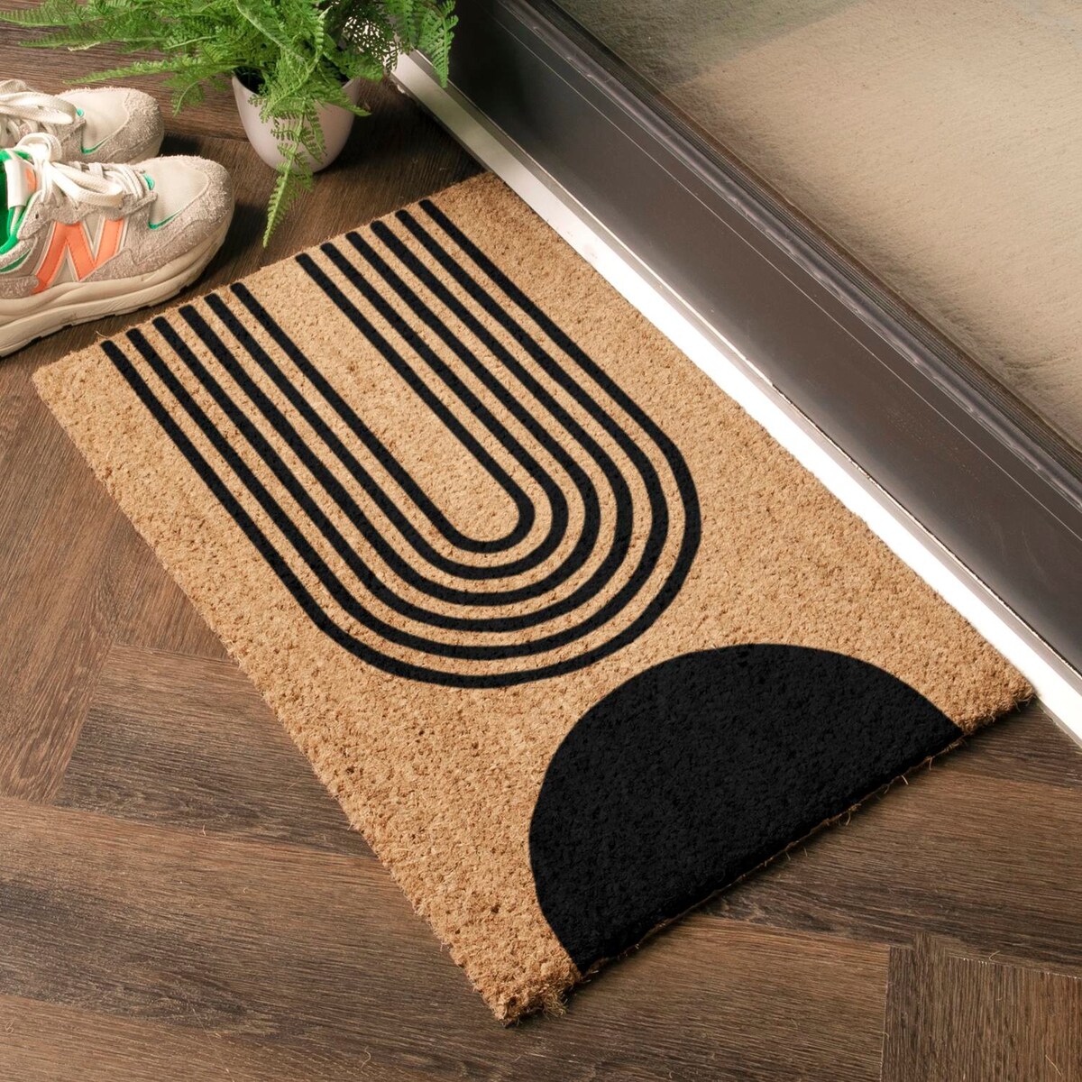 Wycieraczka z abstrakcyjnym półksiężycem