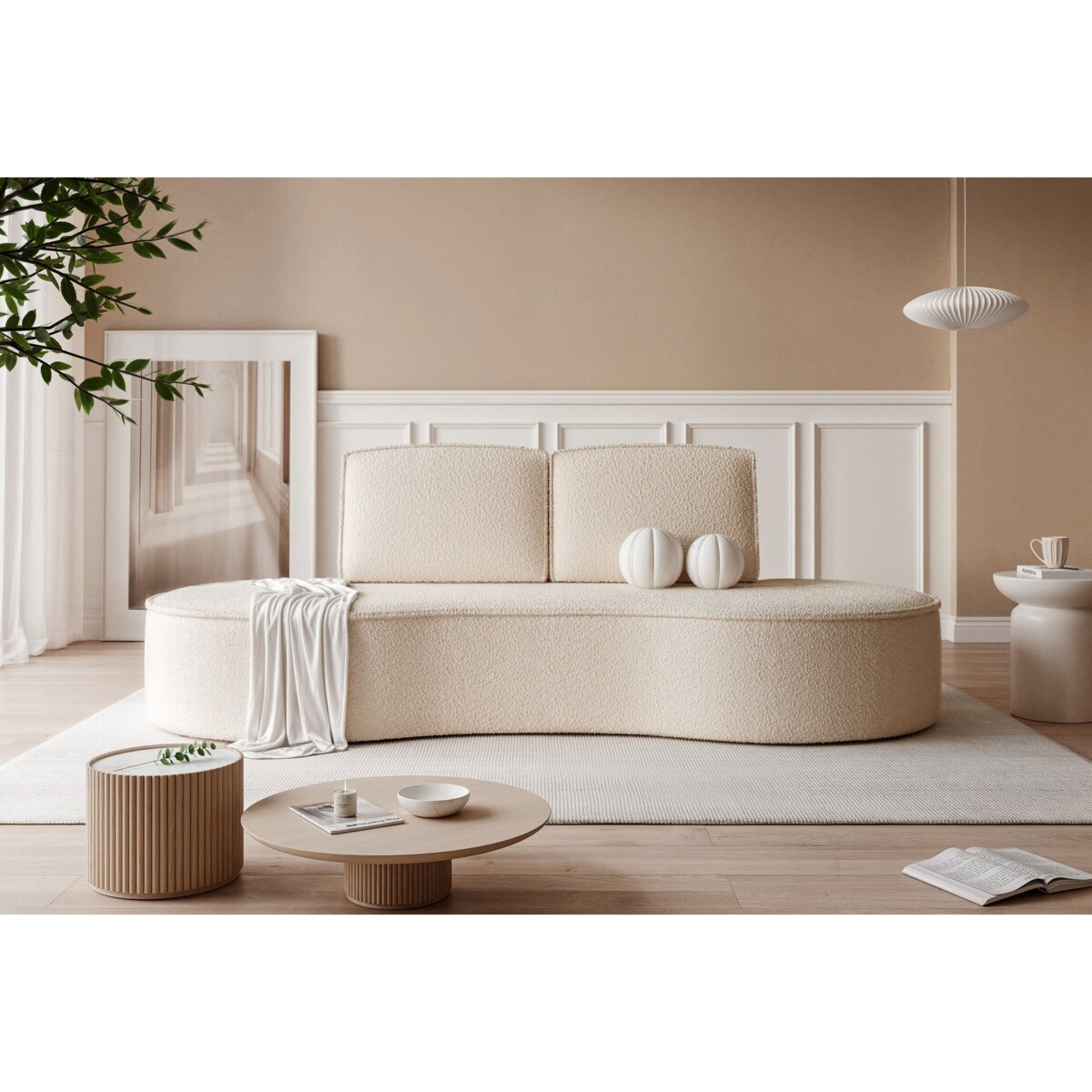 Beżowa sofa tapicerowana do salonu SOFIA o zaokrąglonych bokach - boucle