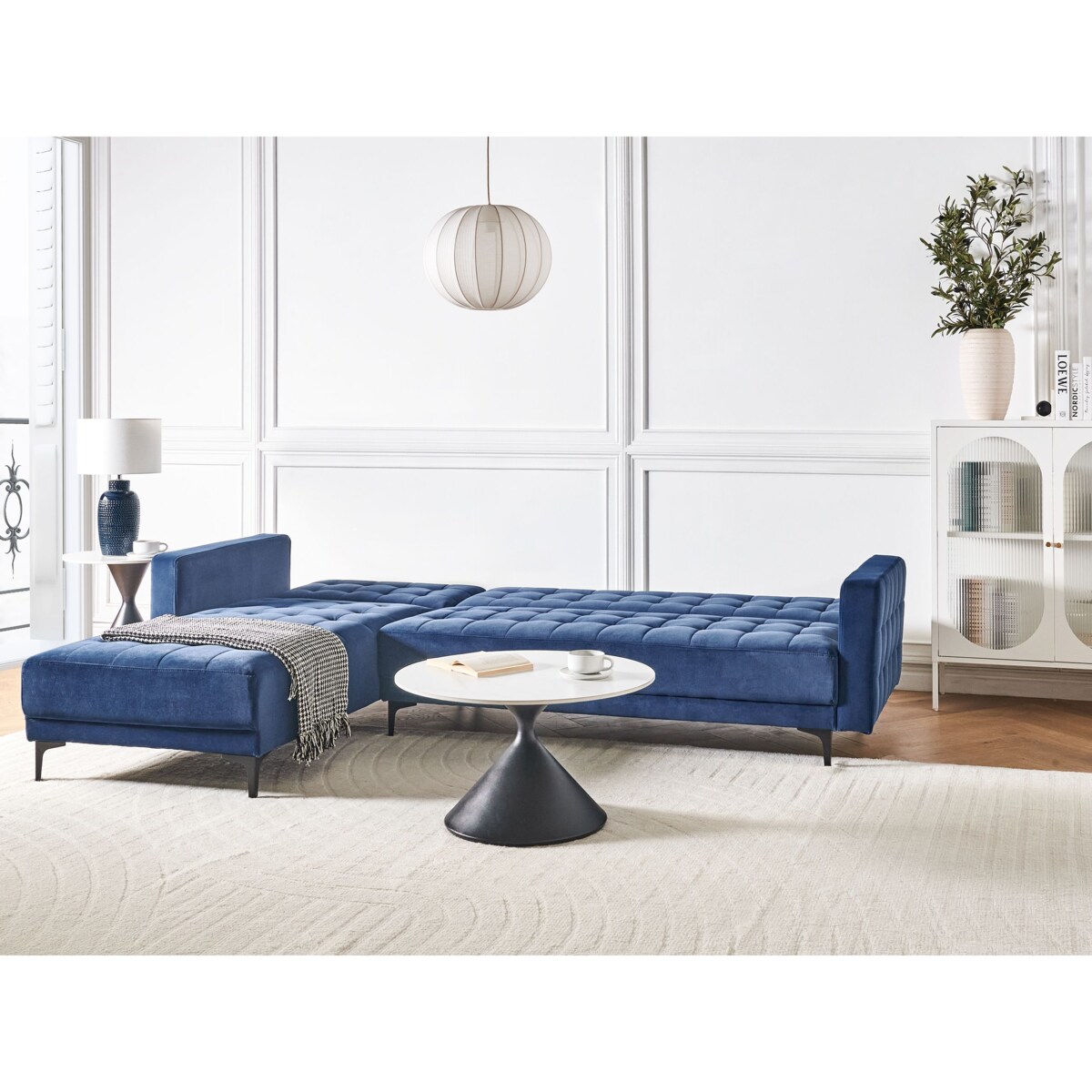 Sofa prawostronna rozkładana welurowa niebieska ABERDEEN