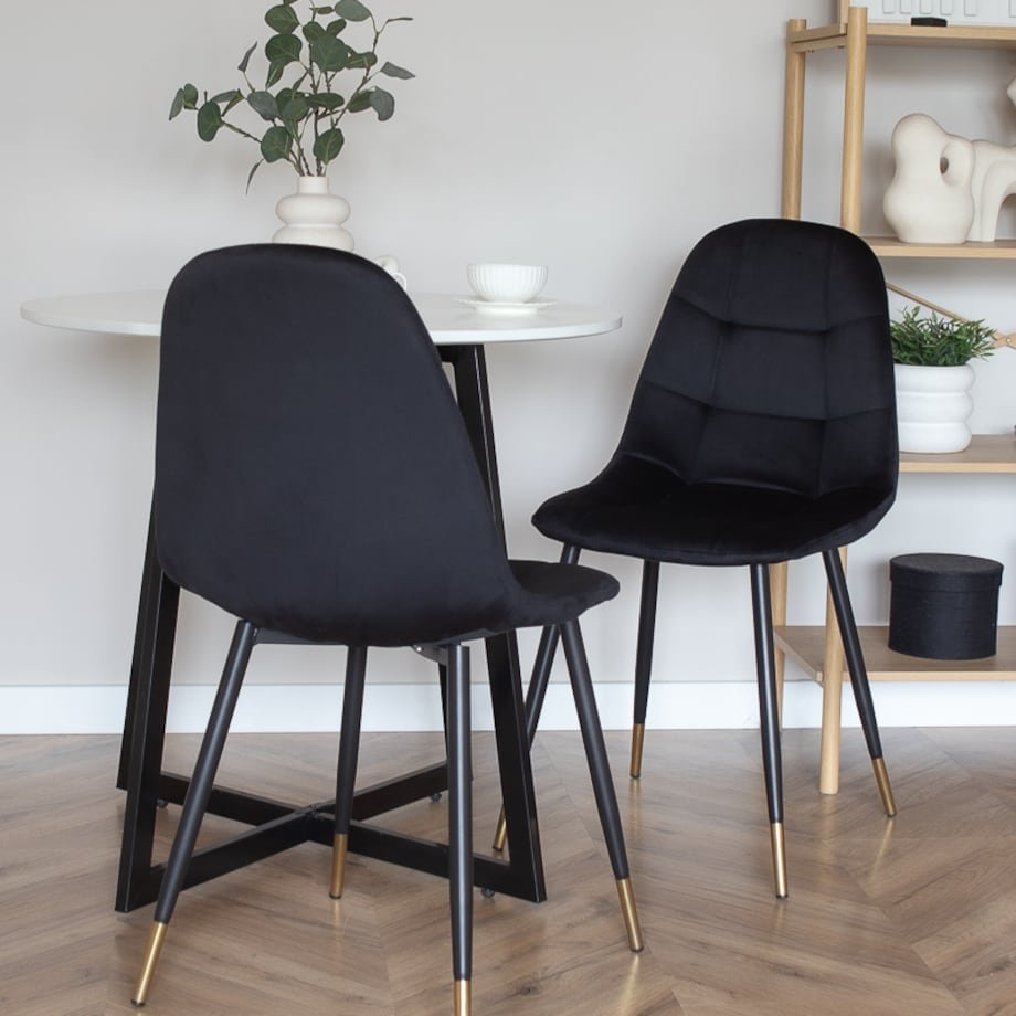 Krzesło tapicerowane czarne pikowane welurowe do salonu złote nogi