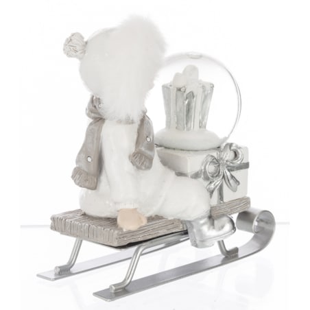 Dekoracja - dziecko na sankach ze szklaną kulą 10,5x10,5x6,5 cm