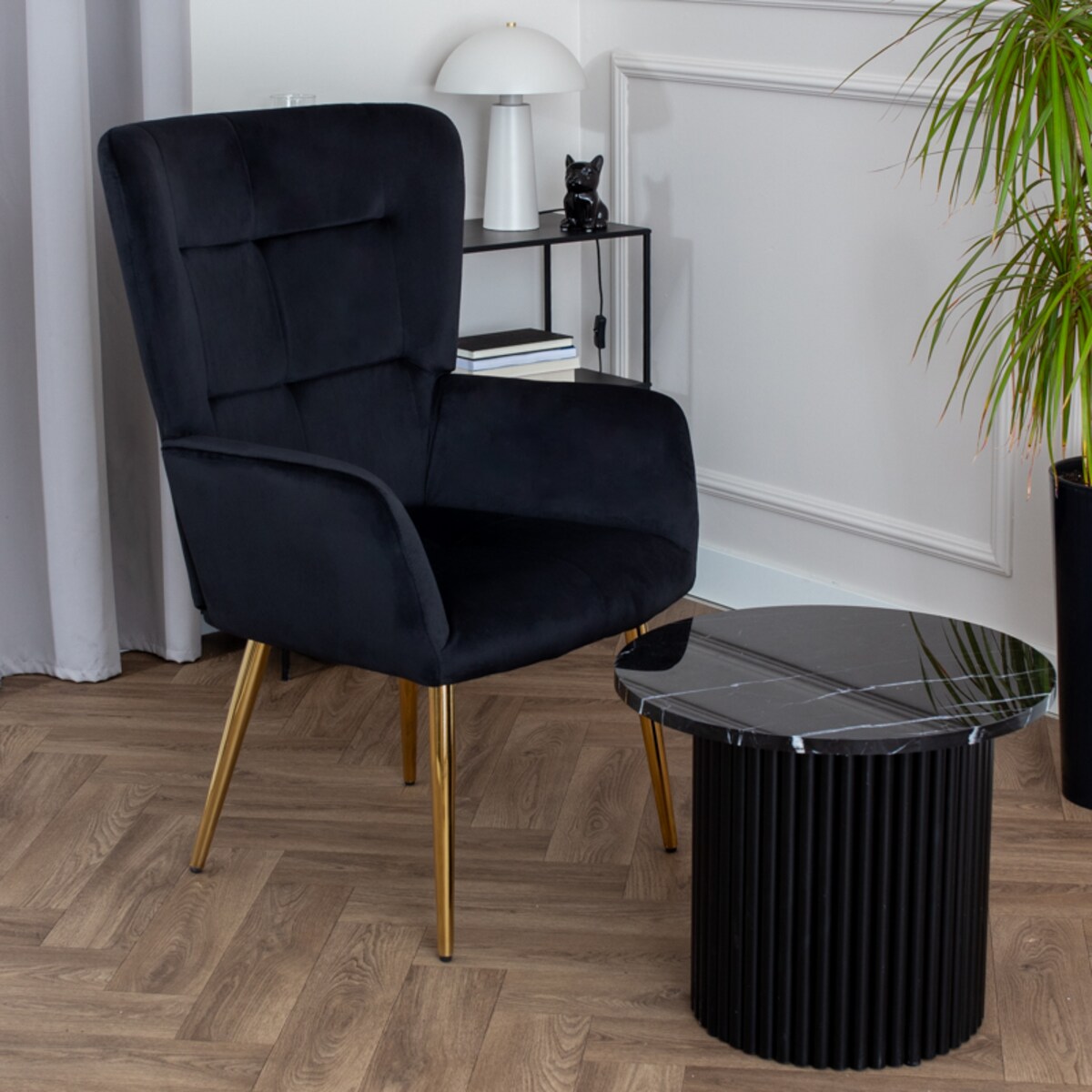 Fotel uszak do salonu wypoczynkowy welurowy tapicerowany czarny złote nogi