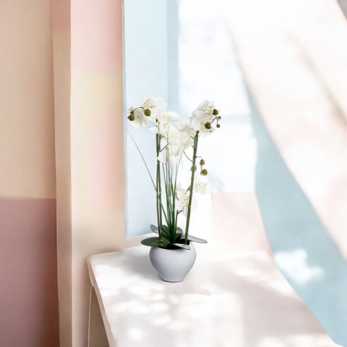 Sztuczny storczyk w doniczce, gustowna kompozycja kwiatowa do dekoracji wnętrz