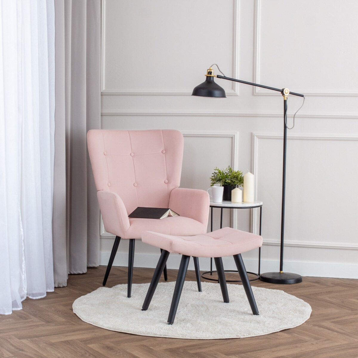 Fotel uszak z podnóżkiem do salonu wypoczynkowy welurowy tapicerowany różowy