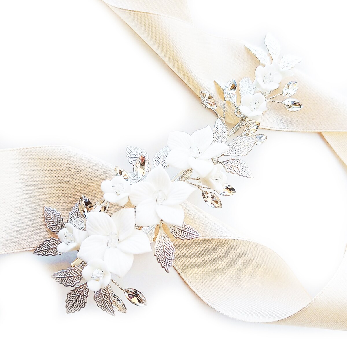 Efektowna srebrna spinka do włosów z kwiatami i cyrkoniami