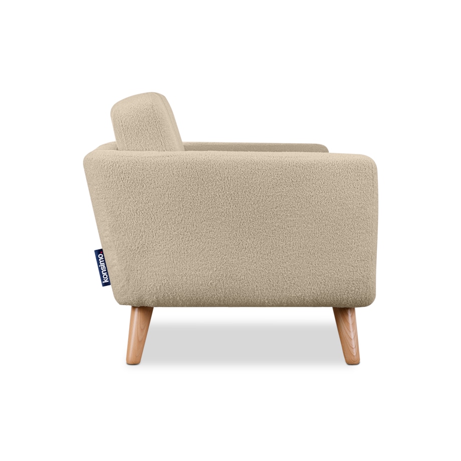 KONSIMO TAGIO Fotel pluszowy skandynawski w kolorze beżowym