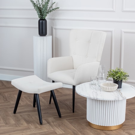 Fotel uszak z podnóżkiem do salonu wypoczynkowy welurowy tapicerowany beżowy