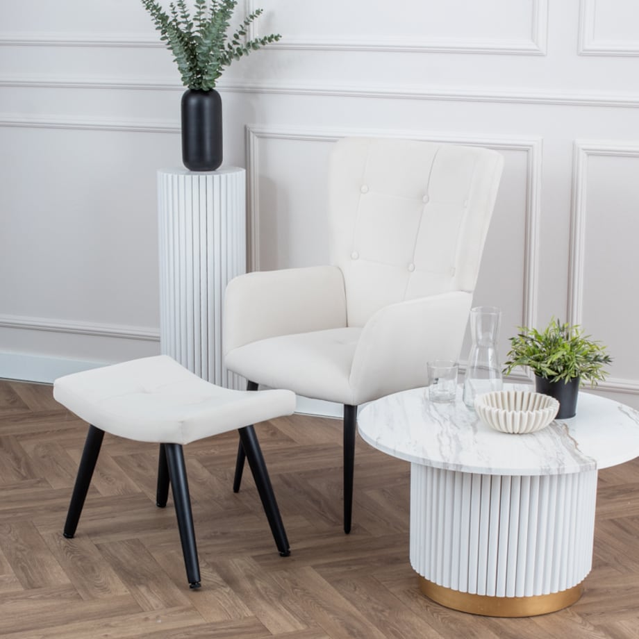 Fotel uszak z podnóżkiem do salonu wypoczynkowy welurowy tapicerowany beżowy