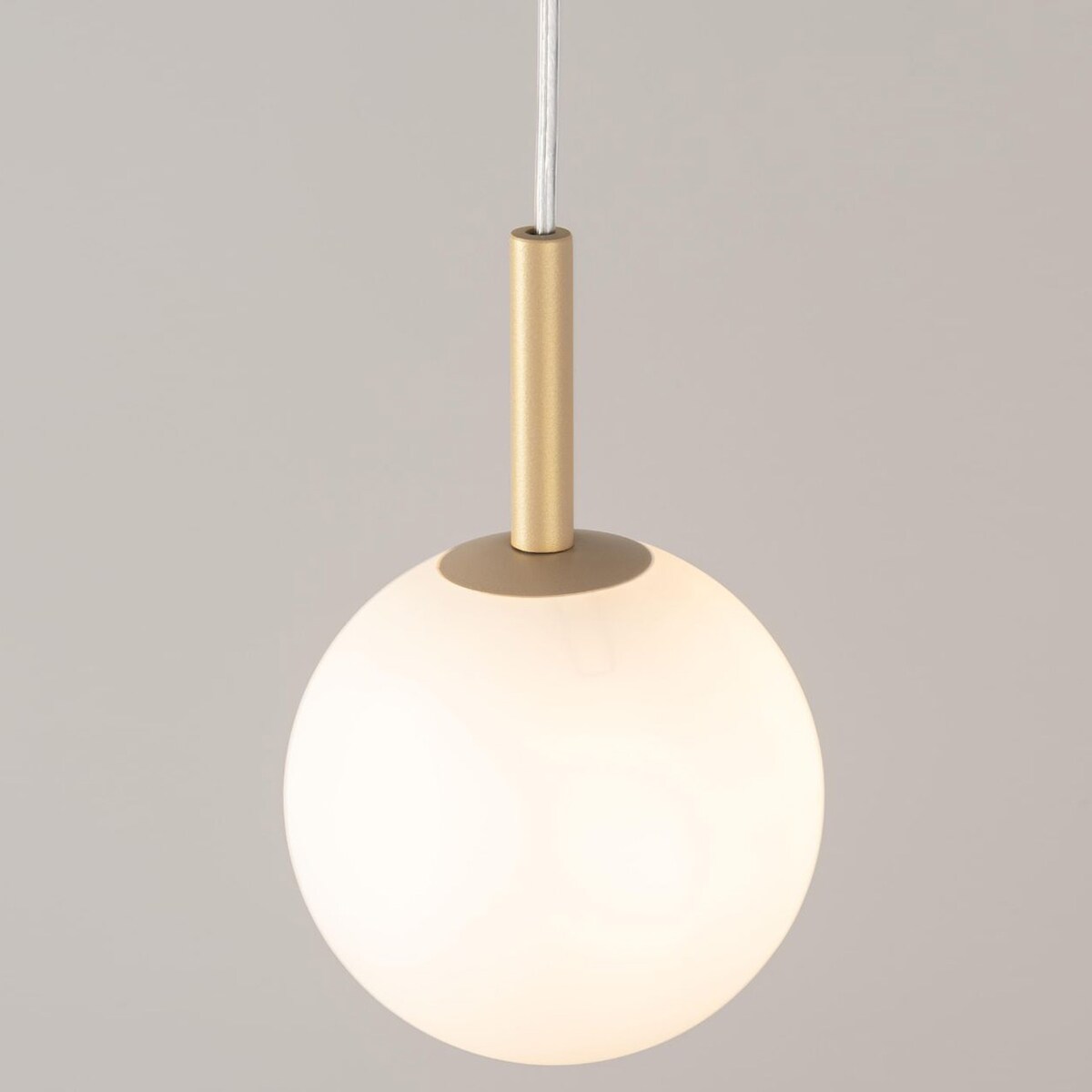 Złota lampa wisząca Gama mleczna kula nad stół do jadalni